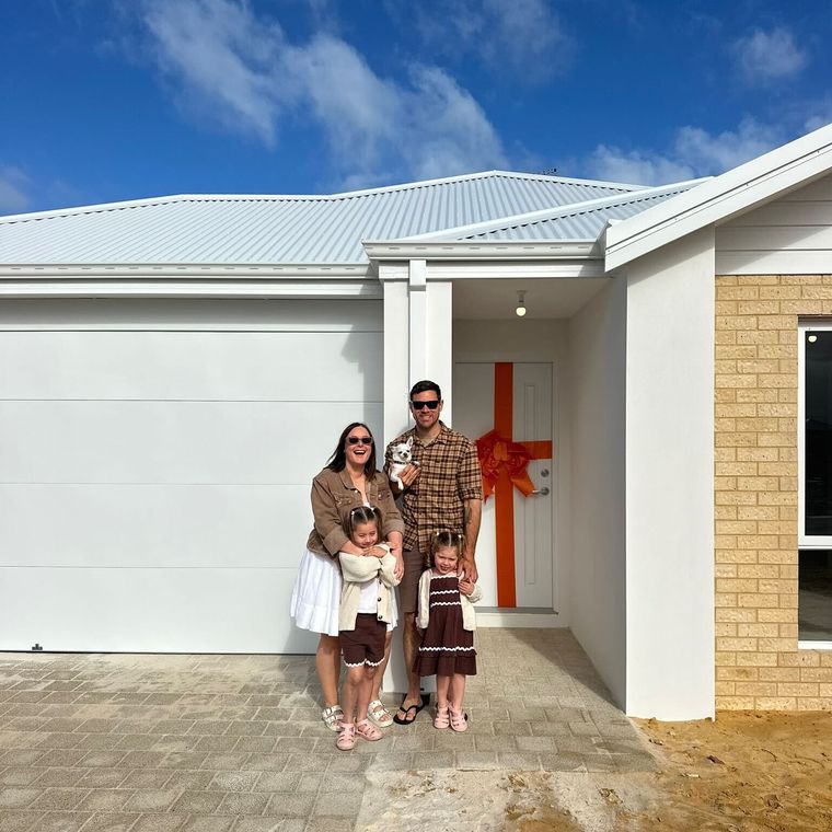 House of Boss clients with the keys to their new Perth home.
