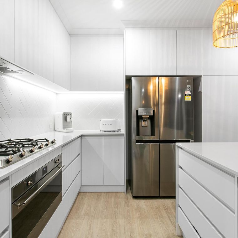 The finished kitchen in a House of Boss client's Hammond Park home.