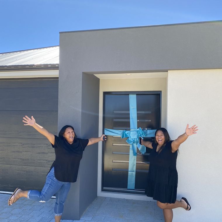 House of Boss clients celebrating at their new home on handover day.