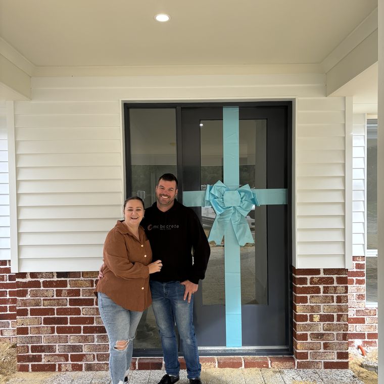 House of Boss clients on handover day at their finished home.