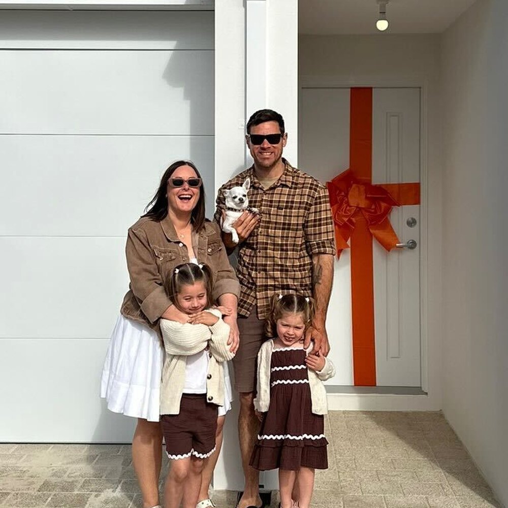 A House of Boss client collecting the keys to their new build.